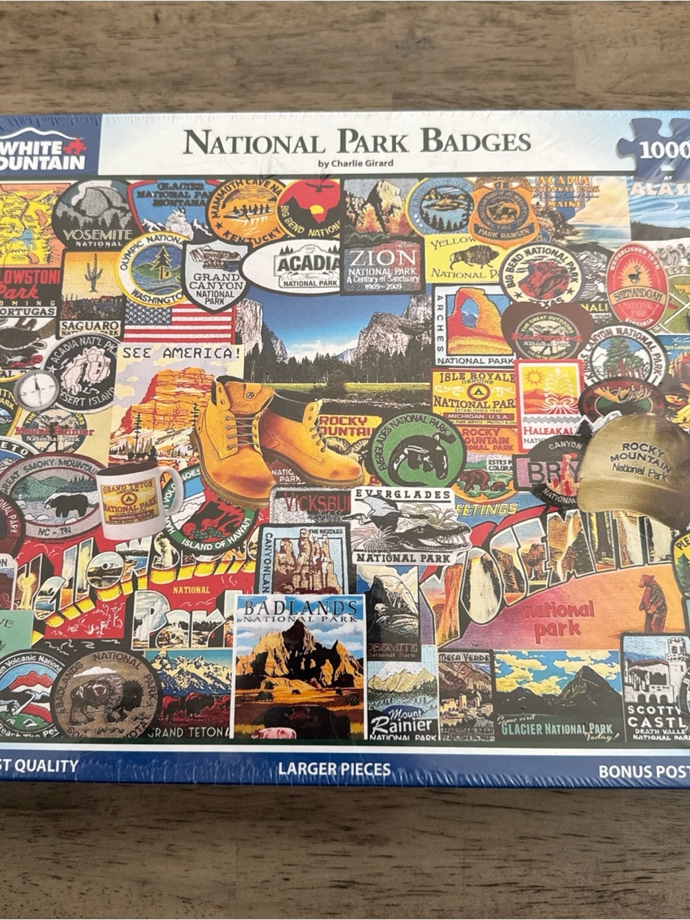 White Mountain Puzzles Box Art — Blue, Red, Yellow, Brown